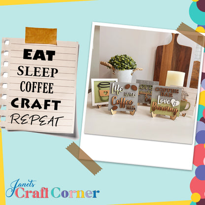 A scrapbook-style graphic features the Coffee Squares by Janet's Craft Corner—a notepad reading "EAT SLEEP COFFEE CRAFT REPEAT" with decorated coffee-themed signs on wood risers, plus plants and a cutting board in the background.
