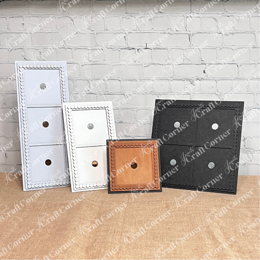 The Janet's Craft Corner Bead Trim Swappable Squares Frame (Small) is a set of 1, shown in white, cream, brown, and black with scalloped edges and round cutouts—ideal for DIY seasonal home decor and displayed on burlap against a white brick wall.