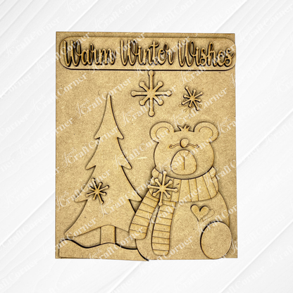 The Welcome Winter Sign from Janet's Craft Corner is a hand-painted wooden plaque showcasing "Warm Winter Wishes" text, adorned with a tree, snowflakes, and a polar bear. It's an ideal piece of charming home decor to celebrate the season's arrival.
