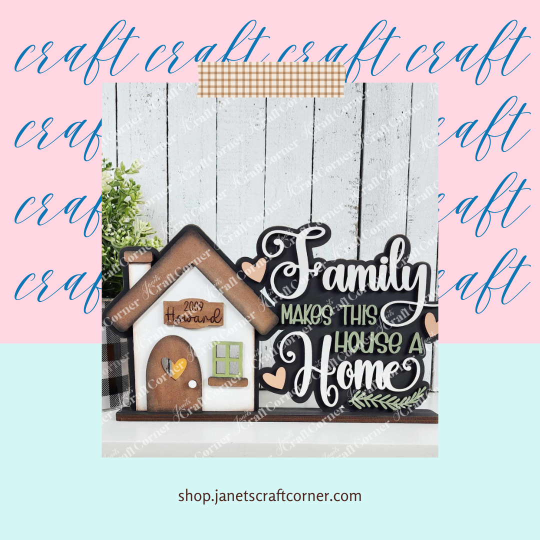 On a shiplap backdrop, the "Family makes this house a home" sign from Janet's Craft Corner features hearts and leaves. The background alternates between pink and blue with "craft" printed repeatedly. It's highlighted by the Family Home Word Art Votive Holder Shelf Sitter DIY decor kit.