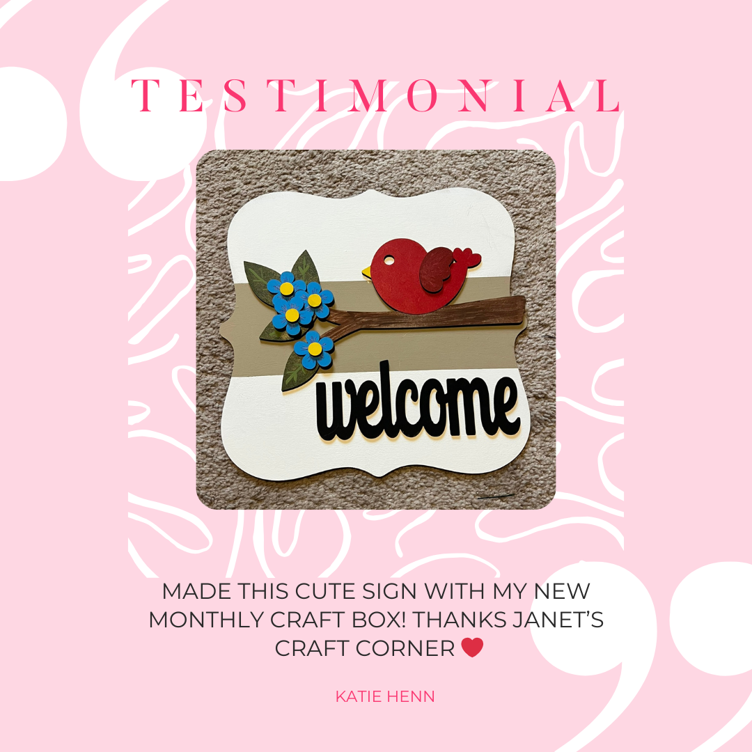 The Bird Welcome Sign by Janet's Craft Corner features a red bird on a branch with blue flowers, "welcome" elegantly below. It's highlighted as an entryway craft box creation against a "Testimonial" background.