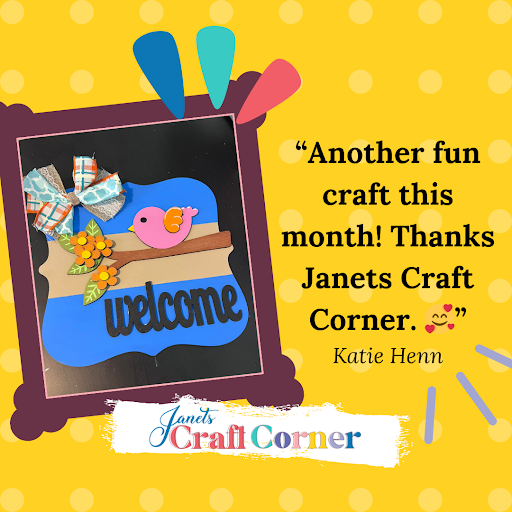 Another fun craft this month! Thanks, Janet's Craft Corner. 🥰" - Katie Henn shared her vibrant scrapbook page featuring the Bird Welcome Sign DIY kit, adorned with a pink bird and flowers. The cheerful dotted yellow background adds a warm entryway touch.