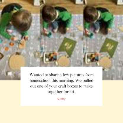 Wearing a green shirt, a child sits on the floor engrossed in crafting with Janet's Craft Corner's "Hello Fall Wall Hanger" DIY kit. Surrounded by colorful paper and scissors, they enjoy creating during a homeschool art session as photos capture their joyful creativity.