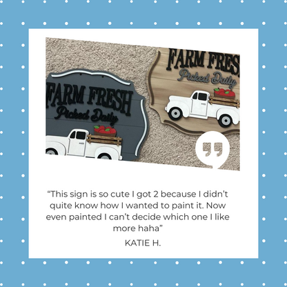 A charming Farm Fresh Apples Sign from Janet's Craft Corner features a blue polka dot background with white trucks and "Farm Fresh Picked Daily" text. Katie H. says, “This sign is so cute I got 2 because I didn’t quite know how I wanted to paint it…”.