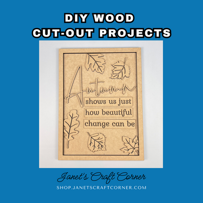 The Autumn Change Shelf Leaner from Janet's Craft Corner is a DIY seasonal home décor craft kit, featuring wooden cut-outs of "Autumn" with leaf designs. It includes the quote: "Autumn shows us just how beautiful change can be," bordered in blue, titled "DIY Wood Cut-Out Projects.