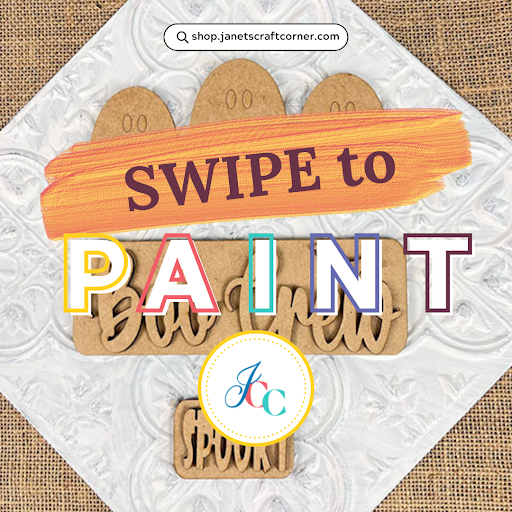 A layered wood cutout square features painted sections, with bold text "SWIPE to PAINT." A circular logo at the bottom center reads "JCC." The burlap-textured backdrop enhances this Boo Crew masterpiece by Janet's Craft Corner, ideal for any interchangeable insert collection.