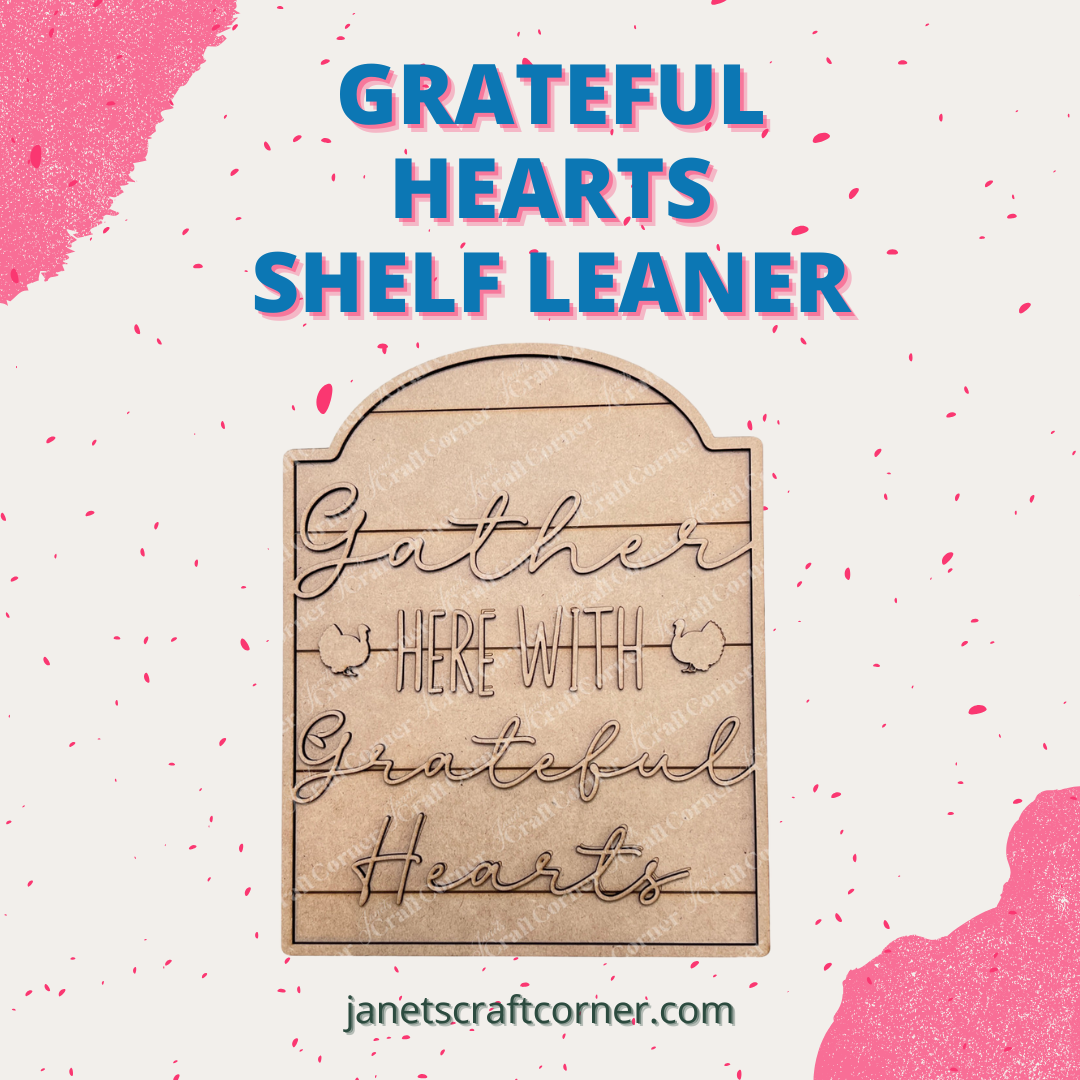 The Grateful Hearts Shelf Leaner by Janet's Craft Corner is a charming DIY kit featuring "Gather Here With Grateful Hearts" on a pink and white speckled background, ideal for adding warmth to any space. Discover more at janetscraftcorner.com.