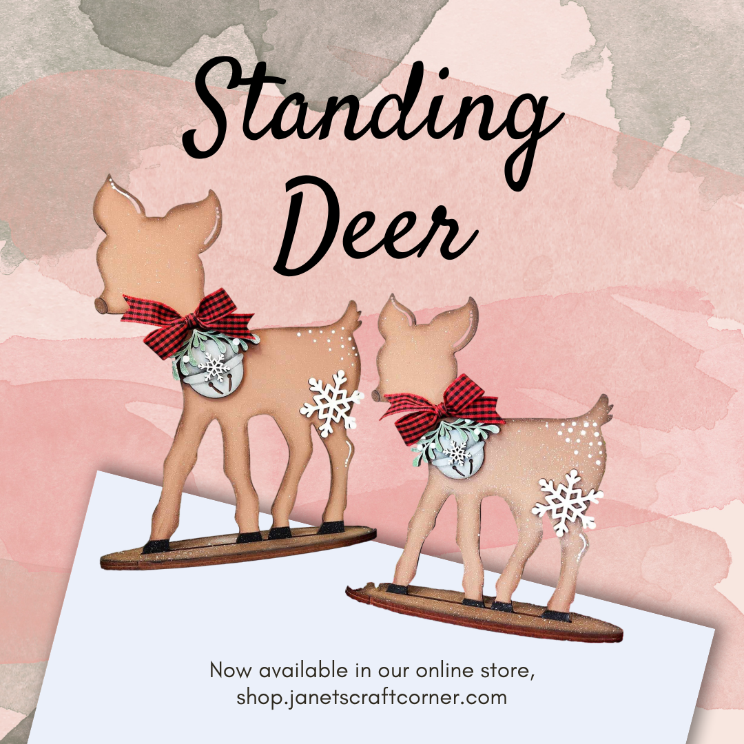 Explore our Standing Deer Shelf Sitters DIY craft kit, featuring two charming deer with red plaid bows and snowflake accents on pastel watercolor. Perfect for nature lovers, find them online at shop.janetscraftcorner.com from Janet's Craft Corner.