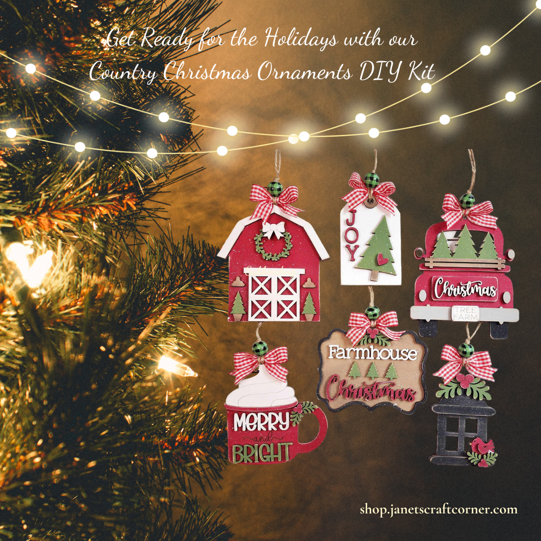 Hang this set of six Country Christmas Ornaments from Janet's Craft Corner, featuring a barn, house, truck with tree, and festive signs against warm white lights. Add a touch of country charm to your DIY projects at shop.janetscraftcorner.com.