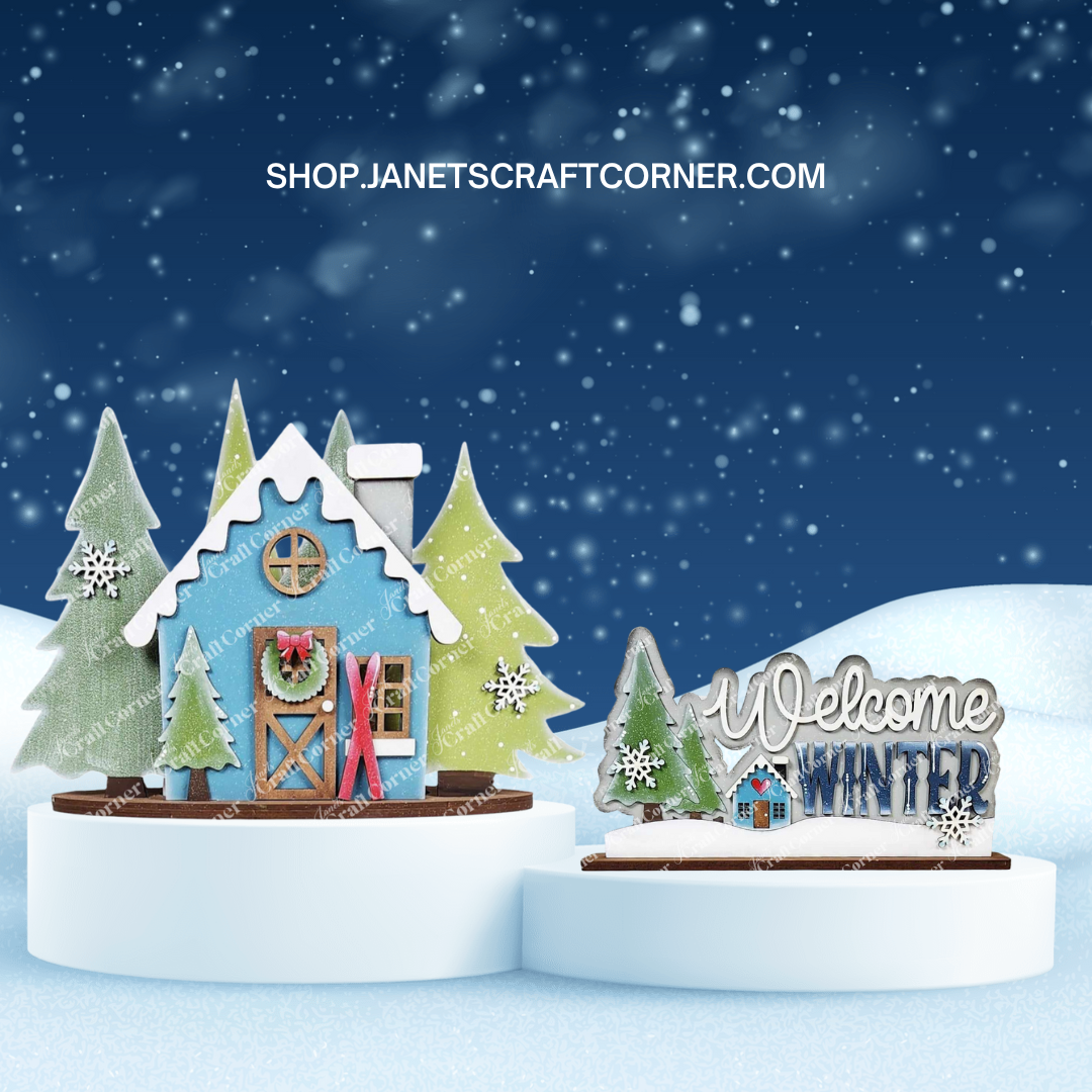 Explore the "Welcome Winter Word Art Shelf Sitter" from Janet's Craft Corner. This DIY kit features a blue gingerbread house with holiday decor, snow-covered trees, and a charming sign. Find this festive home decor at shop.janetscraftcorner.com and unleash your creativity today!.