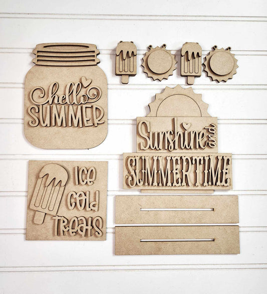 Janet's Craft Corner presents the "Hello Summer Decor Set," a DIY seasonal home decor craft kit. This set includes 6 wooden cutout pieces: popsicles, suns, and signs like "Sunshine and Summertime" and "Ice Cold Treats," perfect for adding summer charm to any space.