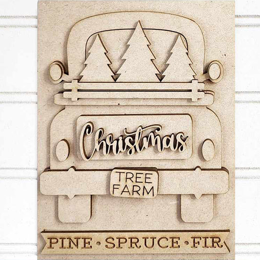 Hand-painted wooden cutout from Janet's Craft Corner, featuring a vintage truck carrying three Christmas trees. This DIY home decor craft kit is ideal with its script "Christmas" detail and "Tree Farm" sign, plus the bottom reads: Pine • Spruce • Fir. Perfect as a Christmas Truck Interchangeable Sign.