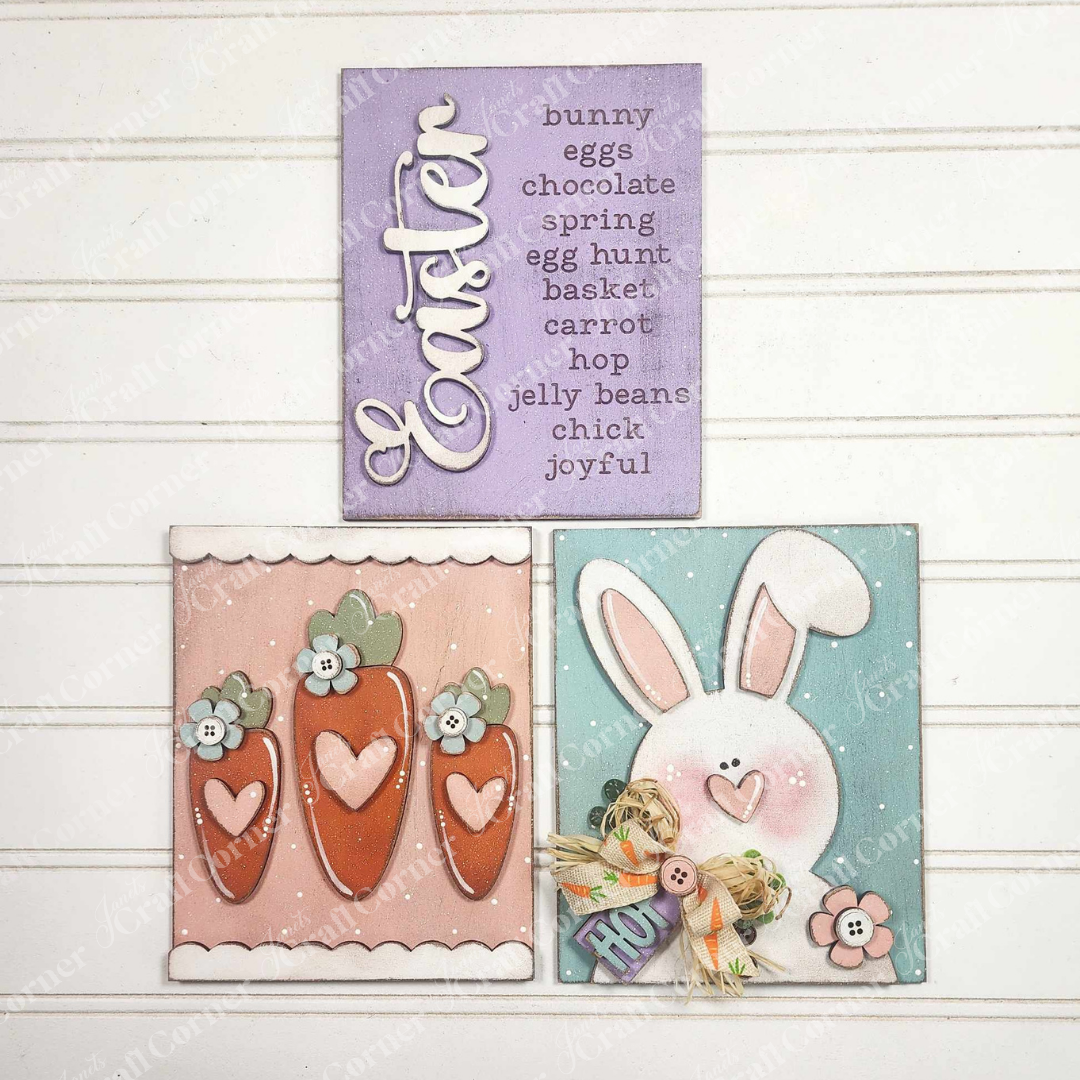 A trio of Easter decor cards from Janet's Craft Corner: The top card displays festive words, the bottom left showcases a Carrots Easter Farmhouse Sign with heart accents, ideal for DIY fans, and the bottom right features a bunny face with a bow tie and carrot.