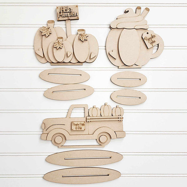 Janet's Craft Corner offers a Pumpkin Latte Mini Shelf Sitter DIY kit, perfect for cozy fall decor. The set includes pieces to assemble mini pumpkin shapes with "Hello Pumpkin," a mug with "Pumpkin Spice," and a truck saying "Pumpkin Patch & Pies.