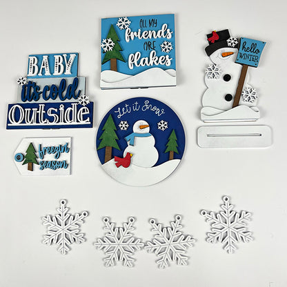 Get into the festive spirit with our Winter-themed home decor. From Janet's Craft Corner, the Hello Winter Tiered Tray Kit includes delightful decorations like snowmen, detailed snowflakes, and whimsical sayings like "Baby it's cold outside." Ideal for DIY enthusiasts eager to create a cozy atmosphere!