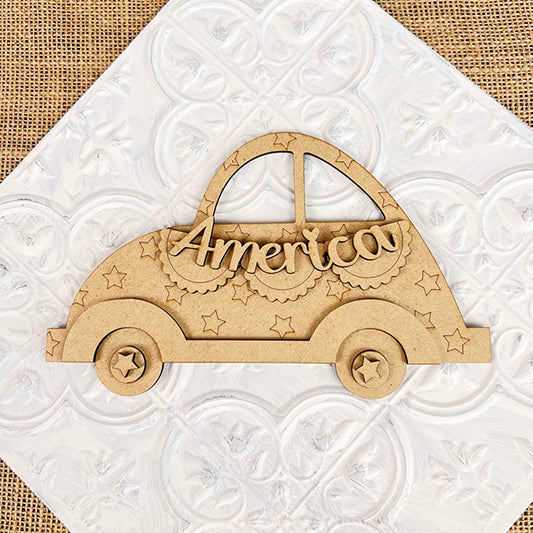 The "America Volkswagen" by Janet's Craft Corner is a wooden craft car highlighted with stars and scalloped edges, making it a charming piece of home décor. Placed against a textured white background framed by burlap, this Americana figure beautifully embodies rustic charm.