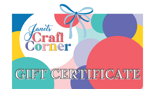 A vibrant gift certificate design showcases overlapping circles in a burst of colors, accented with a blue and red bow. The bold text displays "Janet's Craft Corner" along with "GIFT CERTIFICATE." Discover more distinctive gift cards and certificates at JanetsCraftCorner.com.