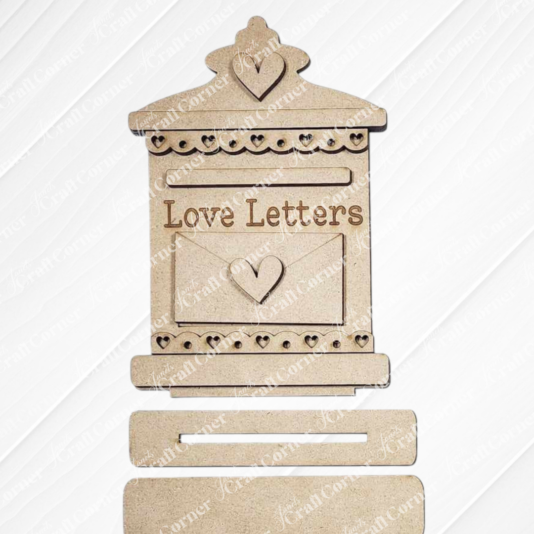 The Valentine Love Letters Decor Set by Janet's Craft Corner is a decorative wooden mailbox featuring "Love Letters" engraving, heart cutouts, an envelope design with a central heart, and a subtle diagonal stripe pattern—ideal for DIY Craft Kit lovers to enrich their home décor.