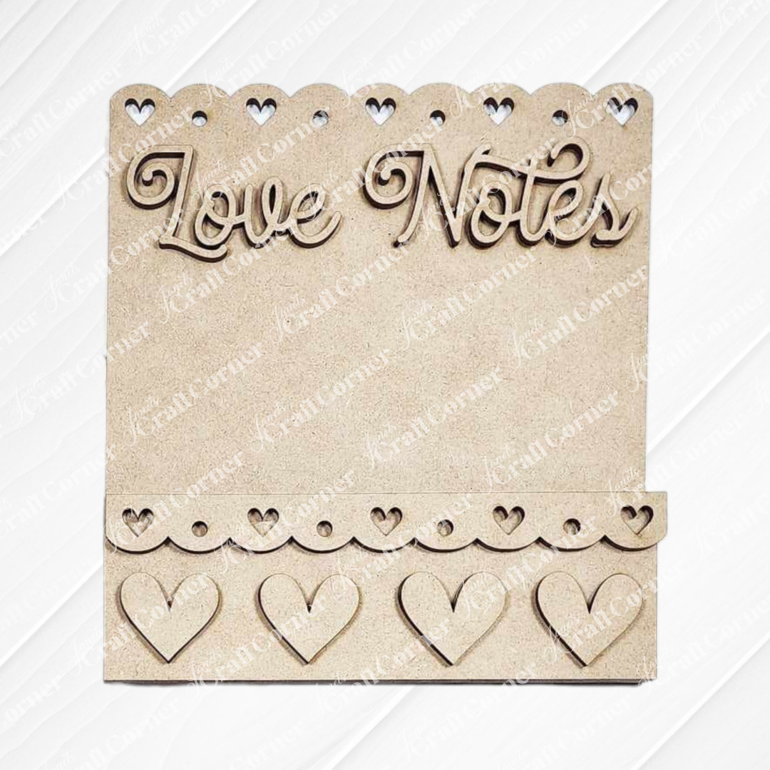 The Valentine Love Letters Decor Set by Janet's Craft Corner is a charming wooden plaque with "Love Notes" at the top, heart cutouts along the edges and bottom, and a small shelf for holding notes, adding personalized charm to your home décor.