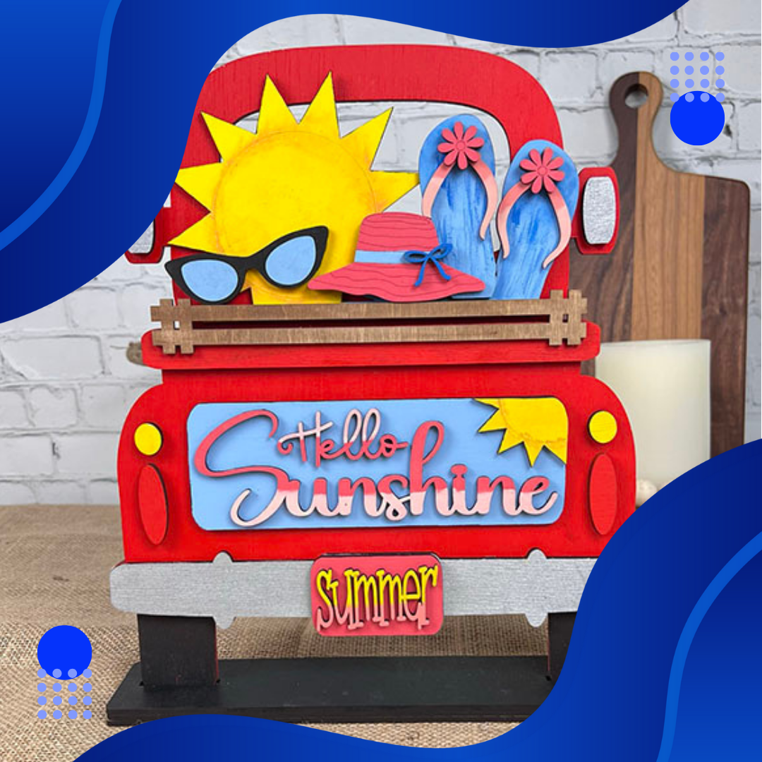 The "Hello Sunshine" interchangeable insert from Janet's Craft Corner is a vibrant red truck sign, adorned with a sun, sunglasses, flip-flops, and a hat—ideal for enhancing outdoor activities against a white brick backdrop with blue and wood accents.