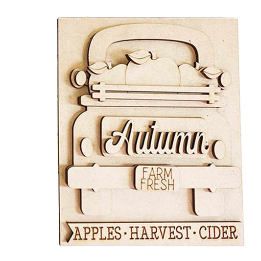 Janet's Craft Corner presents the Autumn Truck Interchangeable Sign, a DIY home decor craft kit featuring a hand-painted wooden plaque. The design includes an intricately carved "Autumn" and a charming truck with "Farm Fresh" on its tailgate, accompanied by the text: "Apples - Harvest - Cider." Ideal for enhancing your seasonal decor.