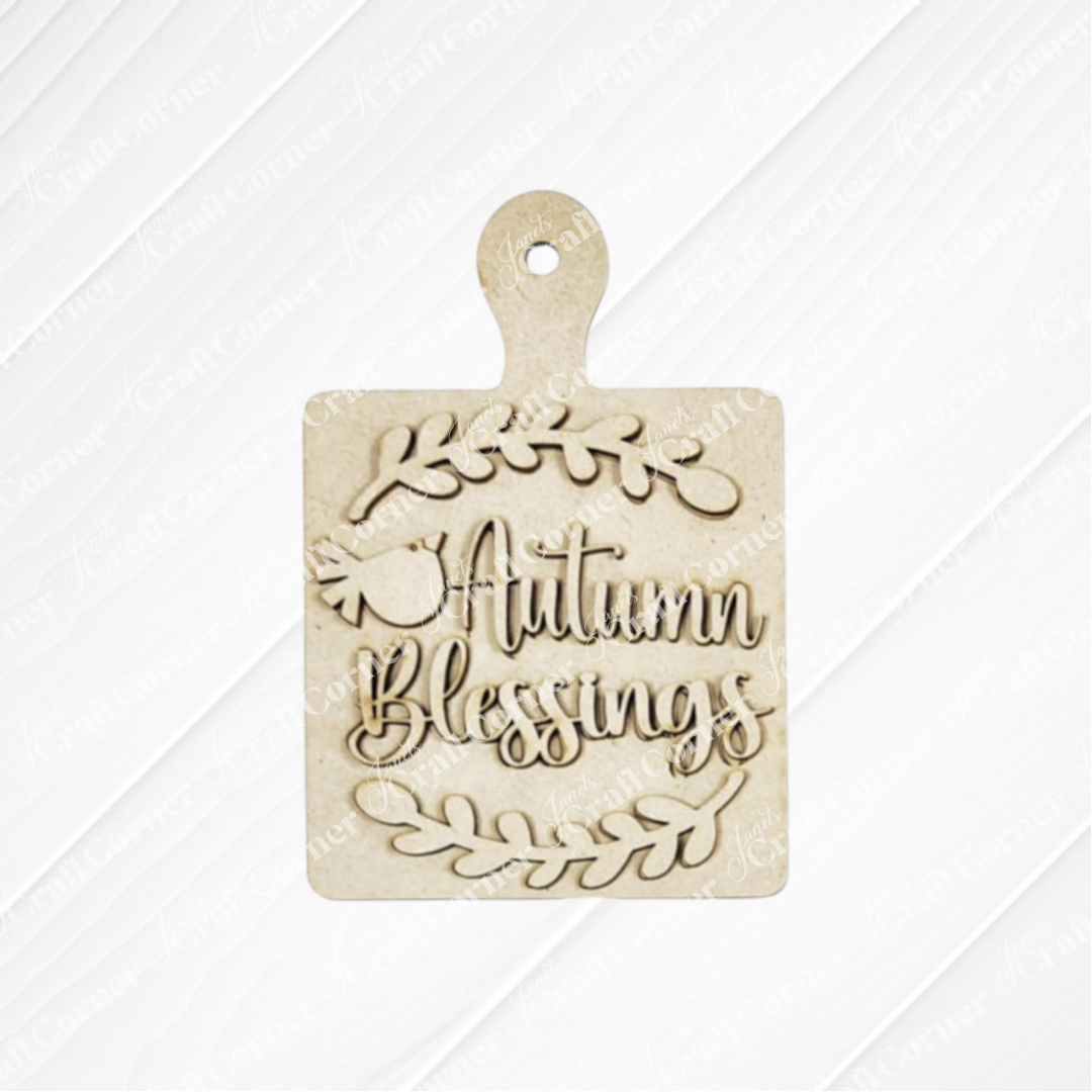 The Fall Scarecrow Mini Shelf Sitter from Janet's Craft Corner is a DIY seasonal home decor kit, perfect for adding festive charm to your shelves or pairing with autumn crafts. Set of 1.