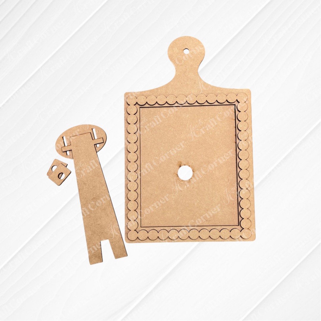 Janet's Craft Corner Bead Trim Breadboard Frame for Switchable Farmhouse Signs—DIY seasonal home decor kit—set of 1. Includes rectangular frame with handle and hole, plus two stand pieces, shown on a white wood background.