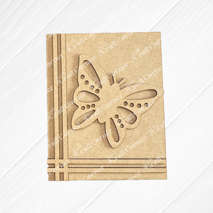 Janet's Craft Corner Spring Switchable Farmhouse Signs DIY Kit: A brown, rectangular wood card featuring a laser-cut butterfly and three parallel lines with a corner accent—ideal for tiered tray styling or seasonal décor projects. White, subtly patterned background included.