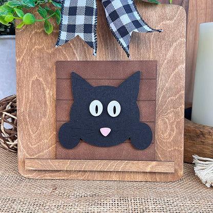 Cat Swappable Squares by Janet's Craft Corner feature a black cat face with wide eyes and a pink nose, plus plaid bow and green leaves—ideal DIY seasonal decor for tiered trays, candles, or rustic accents.