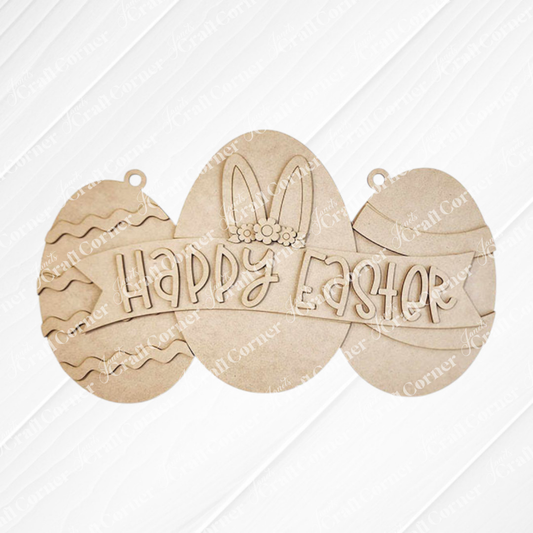 The Easter Egg Sign from Janet's Craft Corner is a charming DIY seasonal home decor craft kit featuring three eggs on a striped background. The centerpiece has bunny ears and a floral headband with "Happy Easter" beautifully written, perfect for adding festive charm to your home.