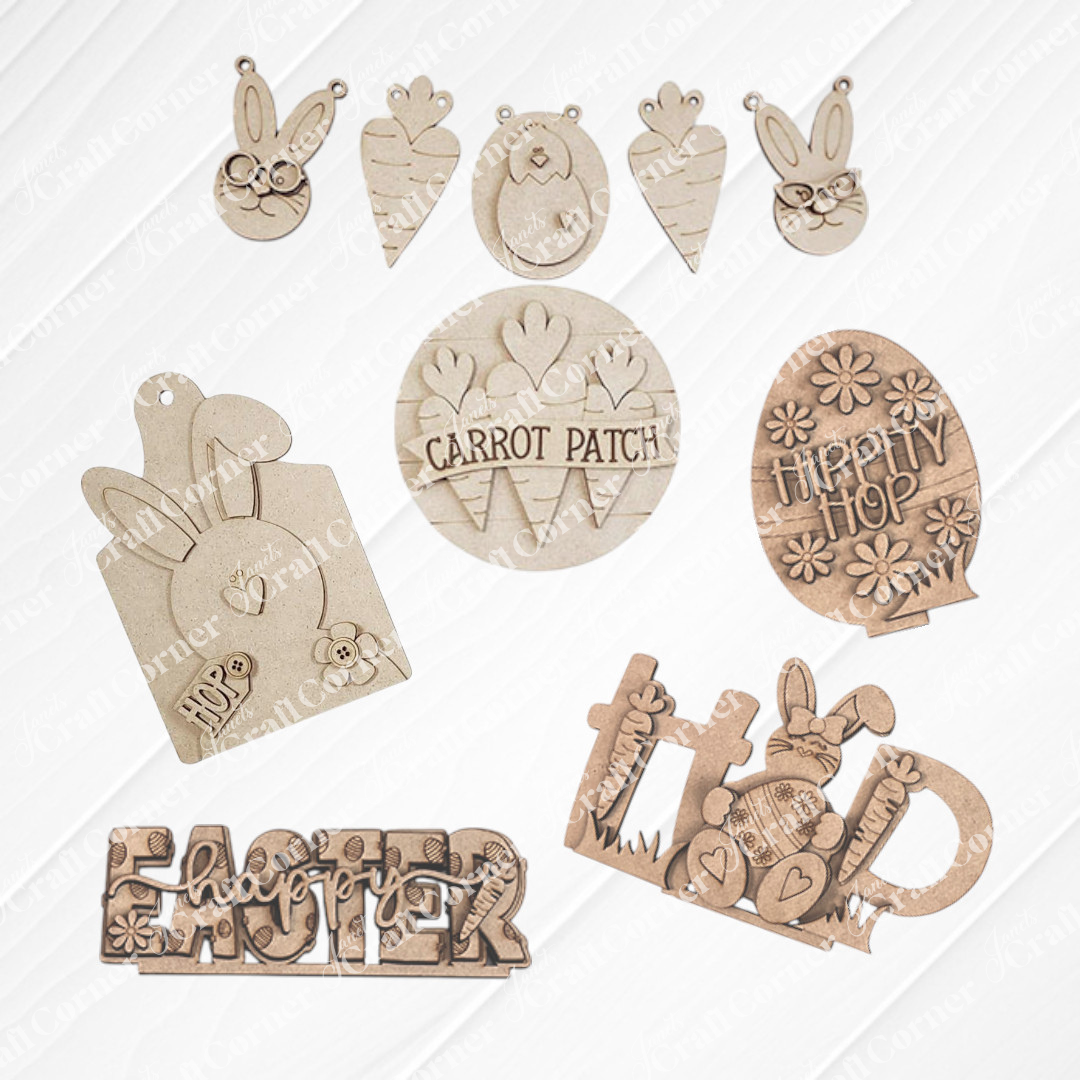Janet's Craft Corner presents the Easter Trio Mini Shelf Sitters DIY kit, a set of 3 wooden pieces: "Happy Easter" sign, an egg shape with "Hippity Hop," and a "Hop" sign with bunny and carrots, all hand-painted with floral designs to elevate your Easter decor.