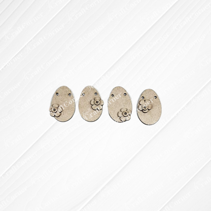 Janet's Craft Corner Easter Decor Set includes five handcrafted beige egg-shaped buttons with engraved smiling faces and small flowers—ideal DIY home decor for charming, seasonal Easter projects.
