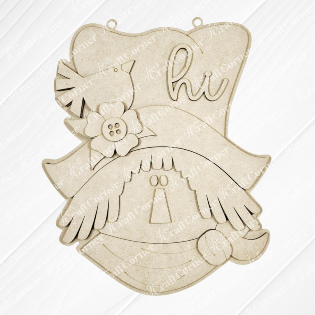 The Fall Scarecrow Door Hanger from Janet's Craft Corner is a DIY seasonal home decor craft kit featuring a cheerful scarecrow with straw hair, a flower hat, and "hi"—perfect for autumn decorating or creative projects. Set of 1.