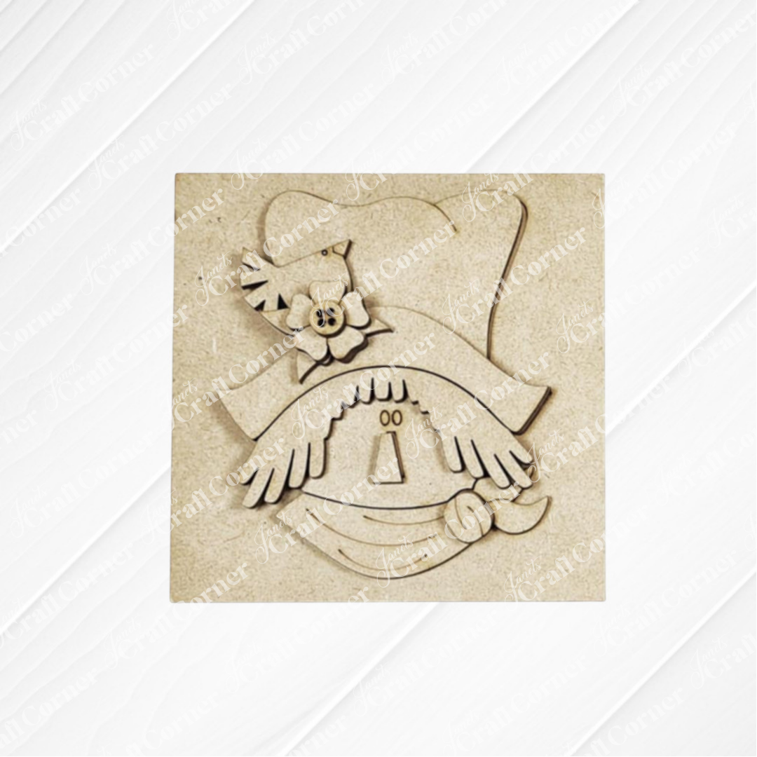 Janet's Craft Corner Fall Scarecrow Squares is a laser-cut wooden decoration with a smiling scarecrow, wide hat, flower, and handkerchief—perfect for seasonal home decor or DIY crafts.