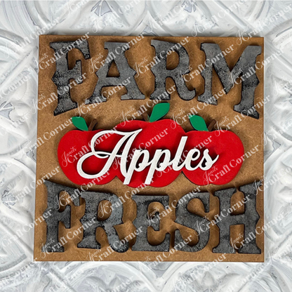 Janet's Craft Corner Farm Fresh Apples Square: A rustic sign reading "FARM FRESH" with "Apples" in cursive above three red apples and green leaves, perfect as a charming DIY seasonal home decor accent for small spaces.