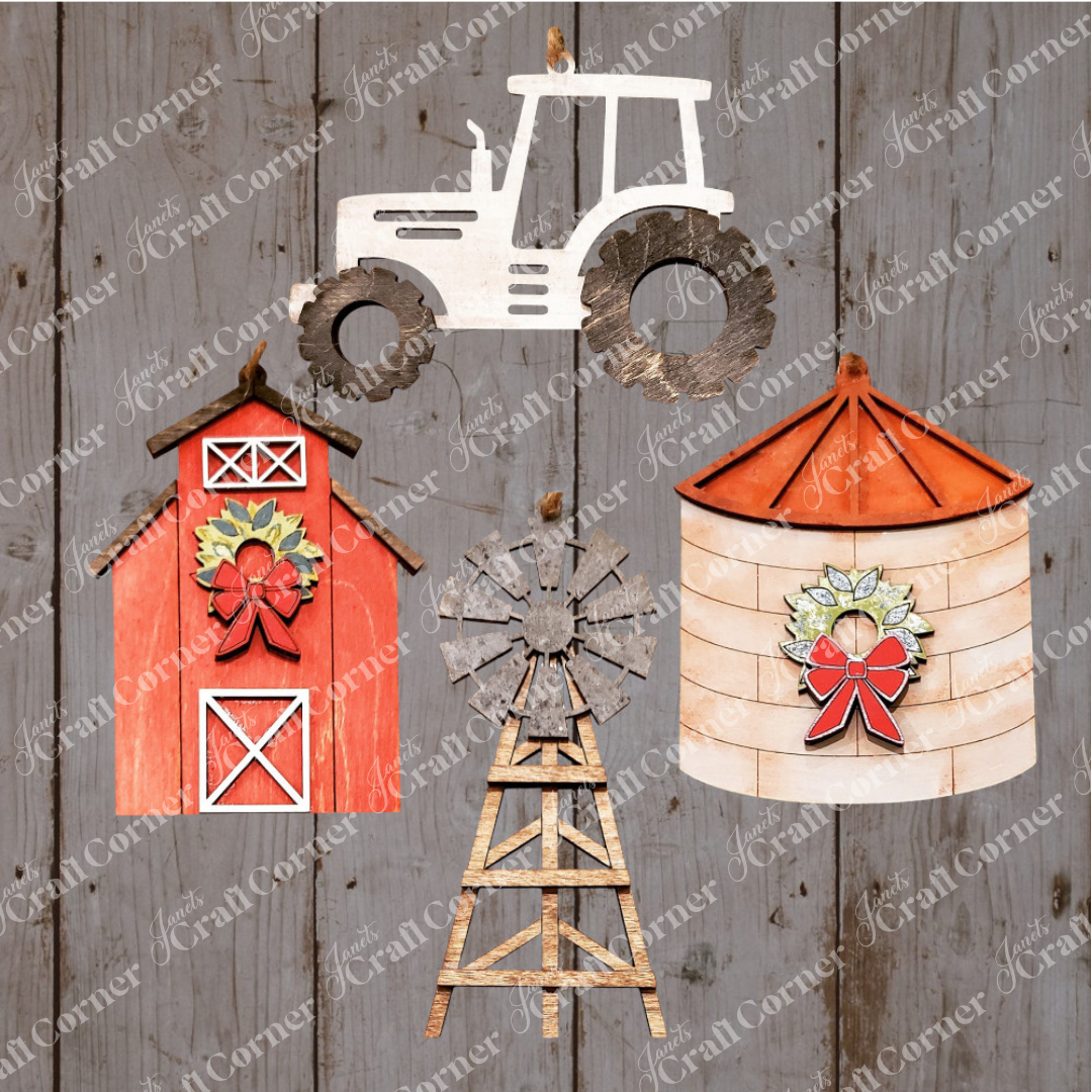 Explore Janet's Craft Corner's DIY Decoration Kits with the Farm Life Christmas Ornaments set, featuring four rustic designs: a red barn, a windmill, a tractor, and a silo. Each ornament is adorned with festive holiday decorations such as bows and wreaths perfectly capturing the spirit of farm life.