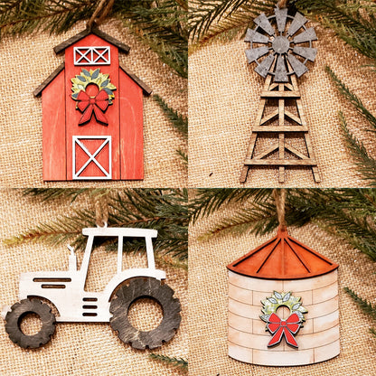 Explore Janet's Craft Corner's DIY Decoration Kits with the Farm Life Christmas Ornaments set, featuring four rustic designs: a red barn, a windmill, a tractor, and a silo. Each ornament is adorned with festive holiday decorations such as bows and wreaths on a burlap backdrop with evergreen branches, perfectly capturing the spirit of farm life.