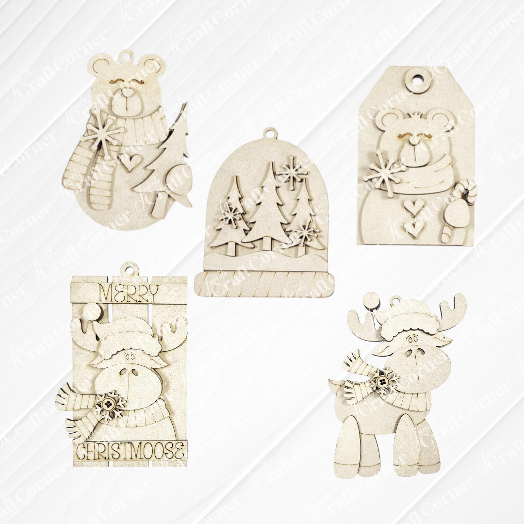 Janet's Craft Corner Forest Friends Ornaments DIY craft kits include your choice of five unfinished wooden ornaments—bear, moose, Christmas trees, tag, and “Merry Christmoose” plaque—all with festive engraved details like scarves and stars.