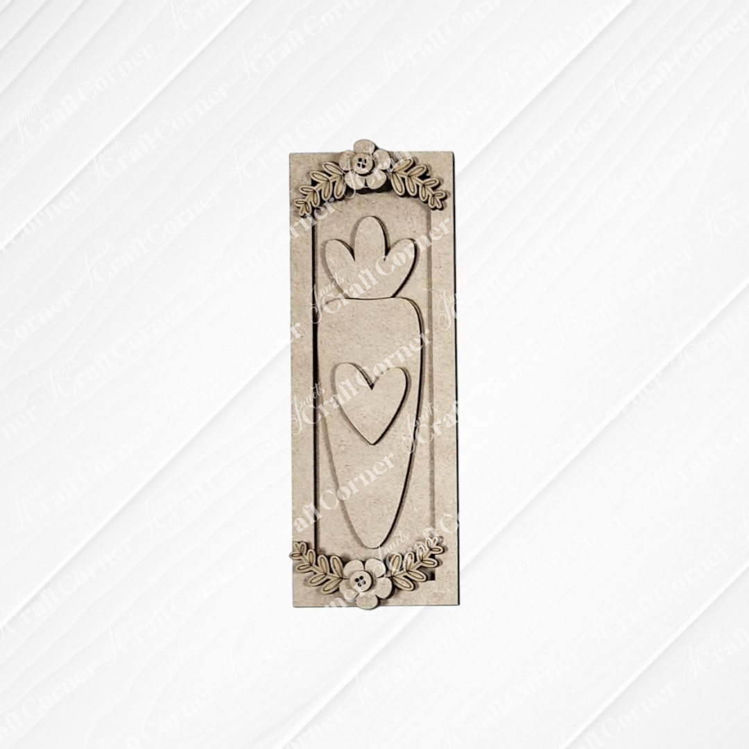 Janet's Craft Corner Easter Decor Set, a DIY seasonal home decor kit (Choice of 5), includes a rectangular wooden plaque with two vertical hearts and floral accents, adding handcrafted charm to any space with its textured, diagonal-line background.