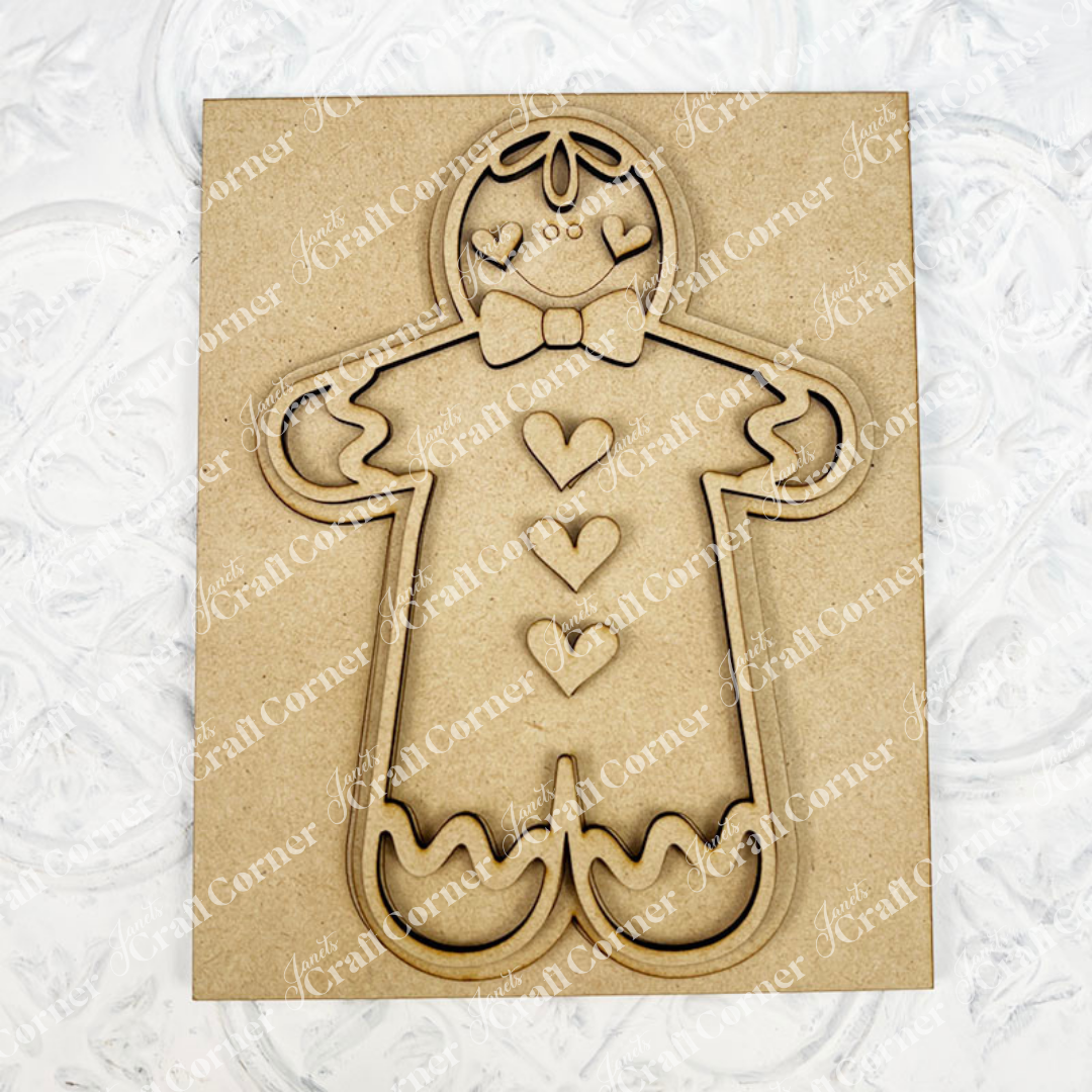 Gingerbread Man Switchable Farmhouse Interchangeable Sign DIY craft kit by Janet's Craft Corner. Features wood cutouts of the gingerbread man and the icing trim.