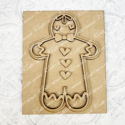 Gingerbread Man Switchable Farmhouse Interchangeable Sign DIY craft kit by Janet's Craft Corner. Features wood cutouts of the gingerbread man and the icing trim.