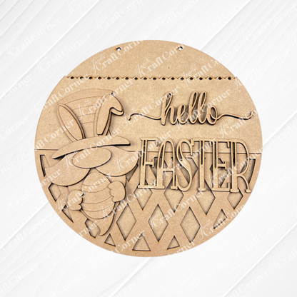 The Hello Easter Gnome Wall Hanger from Janet's Craft Corner is a DIY decor craft kit featuring a laser-cut bunny with an egg and top hat. Set against textured brown fabric, it's perfect for adding seasonal flair to your home.