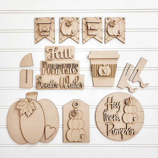 Featuring a charming wooden cutout display against a white background, this delightful DIY Home Decor Kit from Janet's Craft Corner showcases hand-painted elements, including pumpkins and tags. The Hello Pumpkin Decor Set - 6 pieces is adorned with autumn-themed phrases like "Fall Pumpkins" and "Hey there Pumpkin," perfect for adding a cozy touch to your home décor.