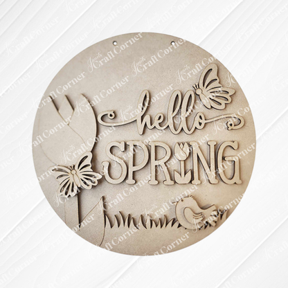 Create your own seasonal charm with Janet's Craft Corner's "Hello Spring Round Door Hanger" DIY kit, featuring decorative "hello spring" on white paneling and cut-out butterfly, flower, bird, and grass shapes—perfect for your spring decor.