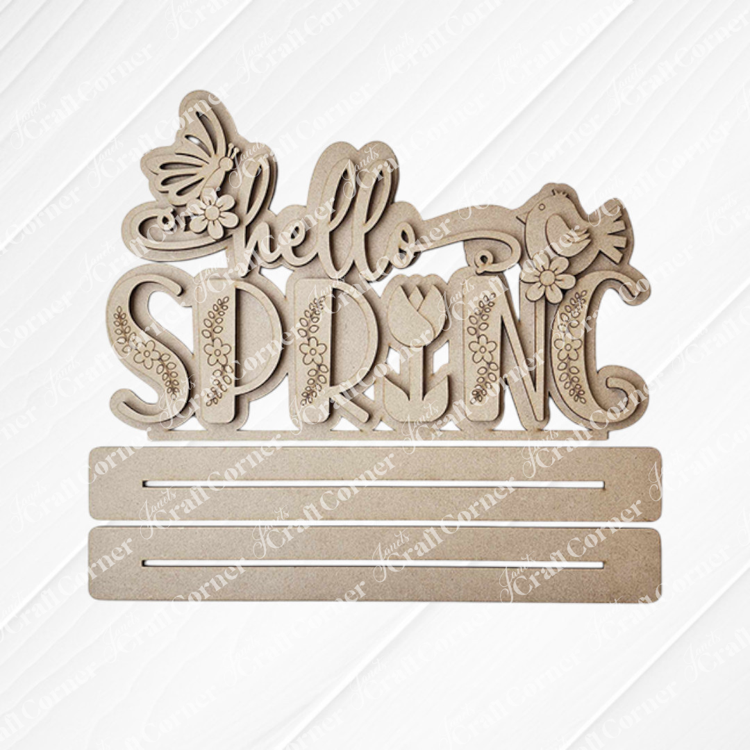 Janet's Craft Corner presents the "Hello Spring" Word Art Standing Shelf Sitter, a DIY wooden cutout featuring decorative script with butterfly, bird, and flower accents. Customize your home décor piece with additional elements using two slots provided.