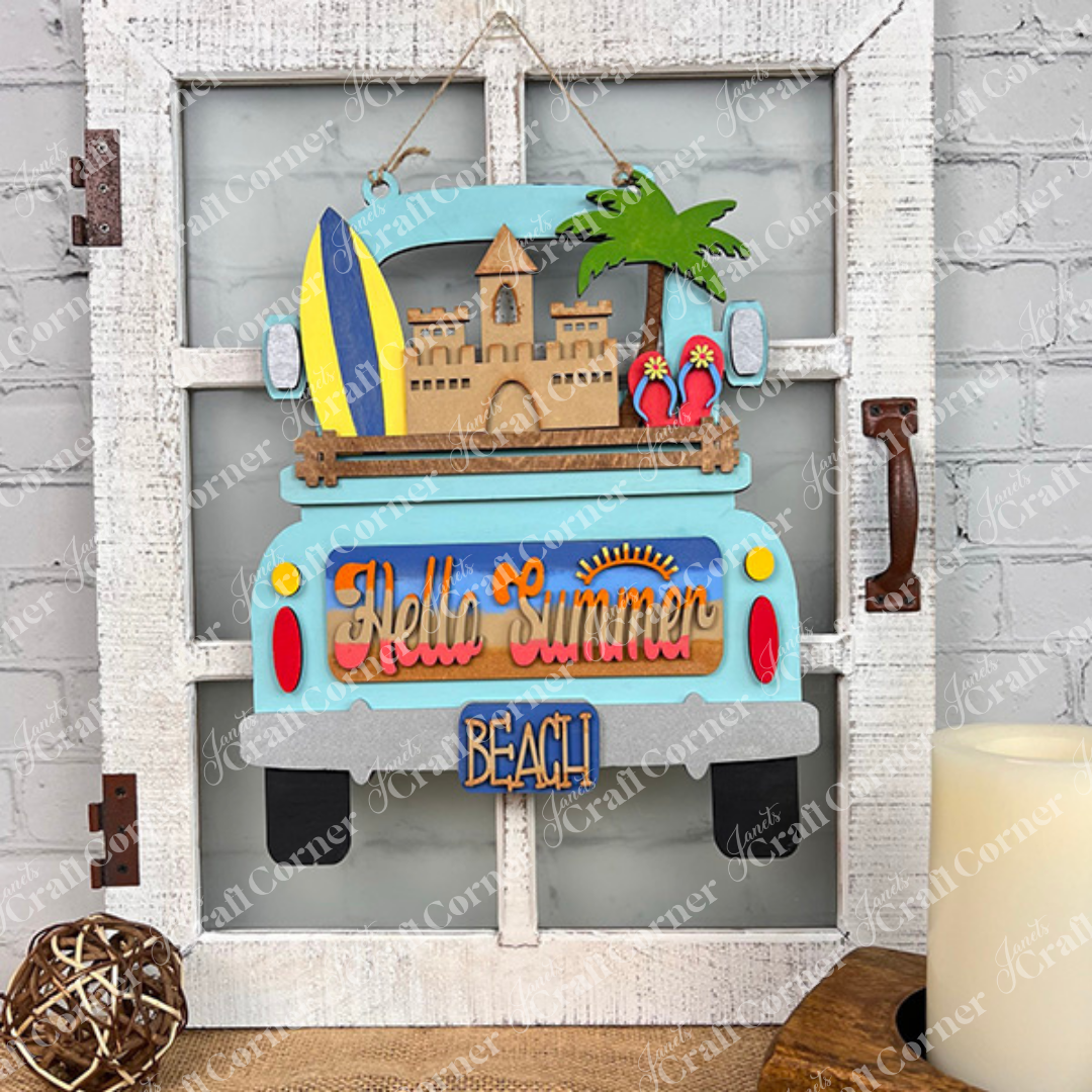 A vibrant truck is decorated with summer-themed accessories: a surfboard, sandcastle, palm tree, and flip-flops. The phrases "Hello Summer" and "Beach" enhance the charm of this hand-painted DIY home decor kit from Janet's Craft Corner. The Summer Beach Interchangeable Insert is perfect as a seasonal decoration piece.