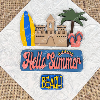 The Summer Beach Interchangeable Insert from Janet's Craft Corner features a textured decorative sign with a sandcastle, surfboard, palm tree, and flip-flops. It displays "Hello Summer" alongside a sun graphic above the bold word "BEACH," making it an ideal DIY home decor kit to add style to your space!