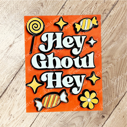 Add festive charm to your home with Janet's Craft Corner Halloween Farmhouse Signs—this orange sign reads "Hey Ghoul Hey" in white and black text, surrounded by yellow accents for perfect DIY seasonal decor.