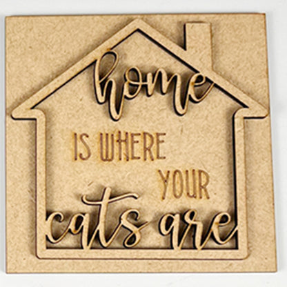 The Cat Swappable Squares by Janet's Craft Corner is a wooden house-shaped sign with "Home is where your cats are" engraved in decorative script, perfect for DIY seasonal home decor in any room.