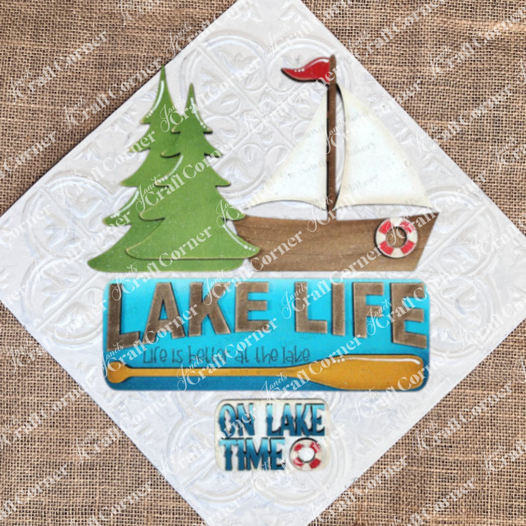 The Lake Life Interchangeable Insert by Janet's Craft Corner is a DIY seasonal home decor craft kit with 3 pieces, perfect for adding lake-themed charm to your space.